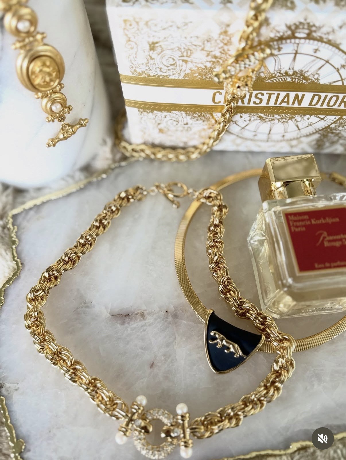 Gold jewelry and perfume styling