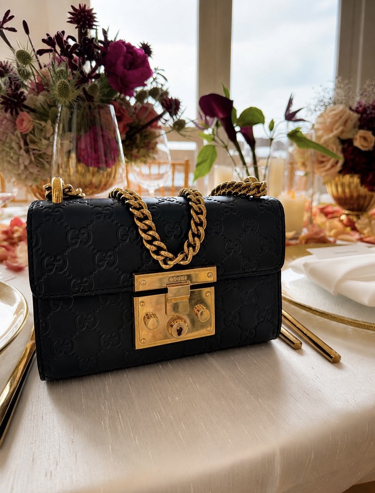 Gucci evening bag styled on a table