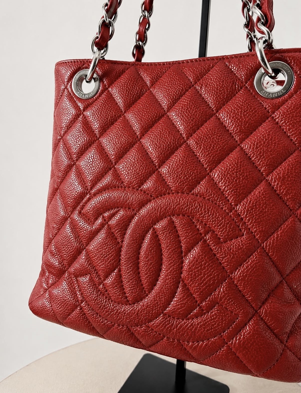 Red Chanel quilted handbag detail